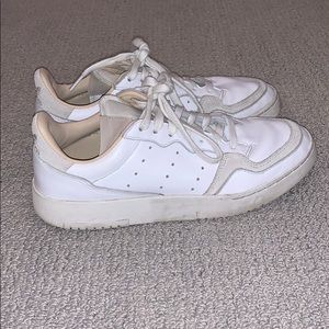 Adidas beige and white sneakers